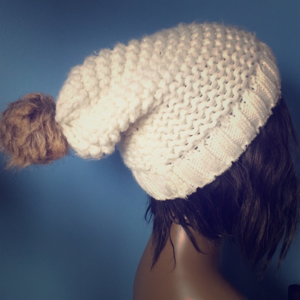 White hat with fuzzy top
